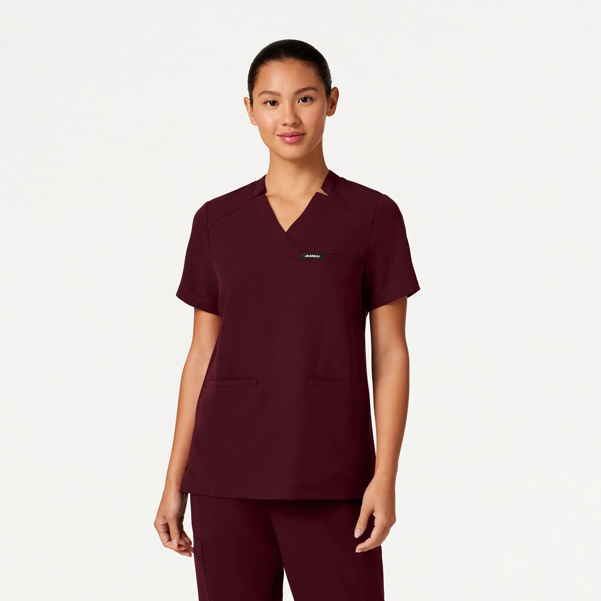 Jaanuu Women's Helia Notched V-Neck Scrub Top - Burgundy Monochromatic Office Style